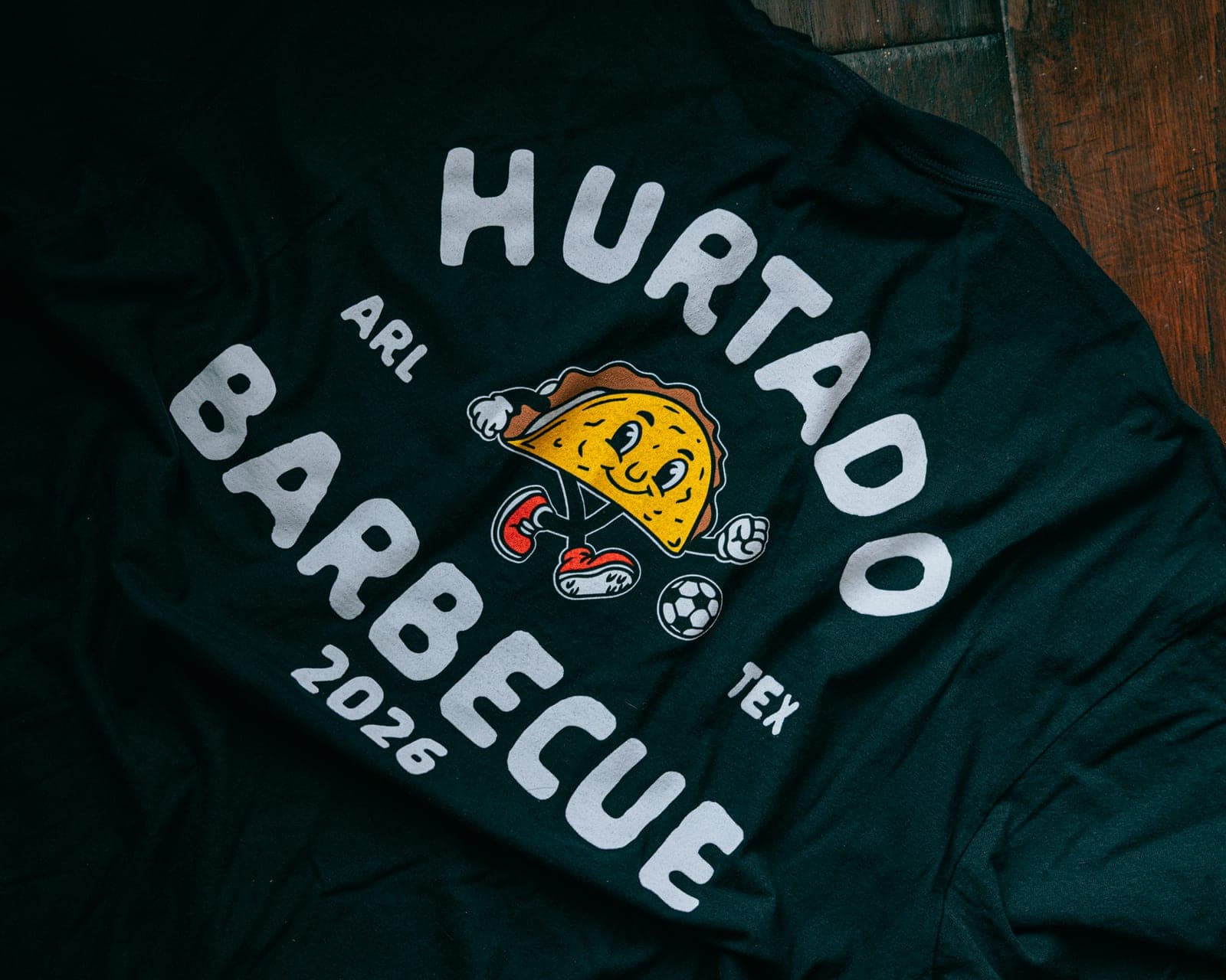 Soccer Taco Tee in black, back badge print